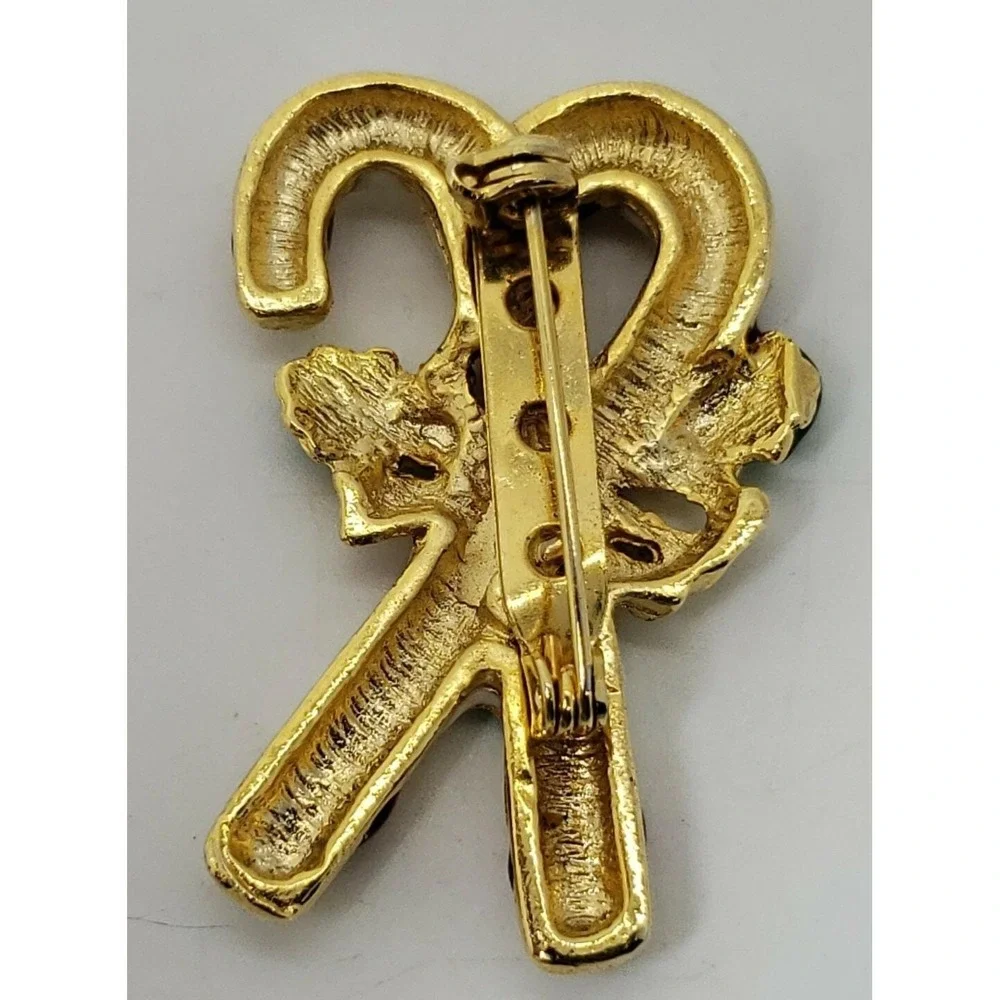 gold tone candy canes with bow and holly Christmas brooch pin‎